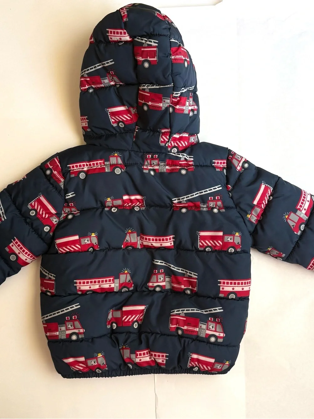 The Children’s Place Kids Navy Puffer Jacket with Red Fire Truck Print